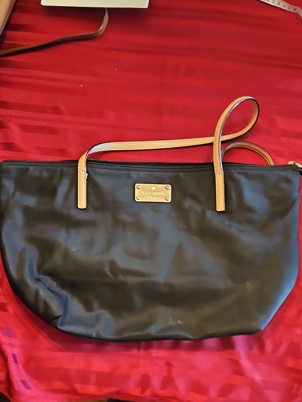kate spade Black Tote with Tan Straps and Gold Plaque